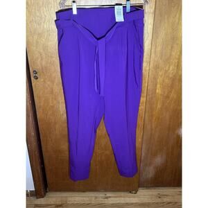 NTW Torrid High Waisted Tie Front Skinny Pants in "Bright Grape" color. Sz 12